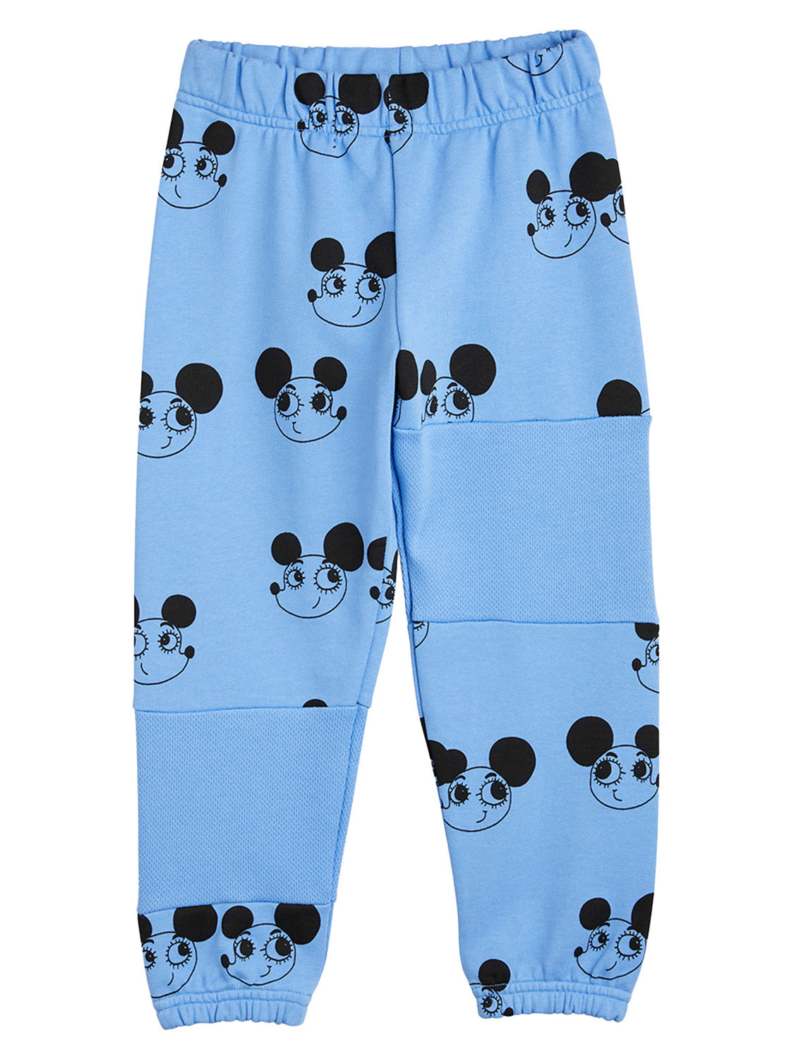 Jogginghose Blau: Kinder-Jogginghose mit elastischem Bund und Bündchen, Bein-Patch-Panels, bedruckt mit schwarzem Cartoon-Mausgesichtsmotiv. Ideal für bequeme Kindermode bei bellybutton.