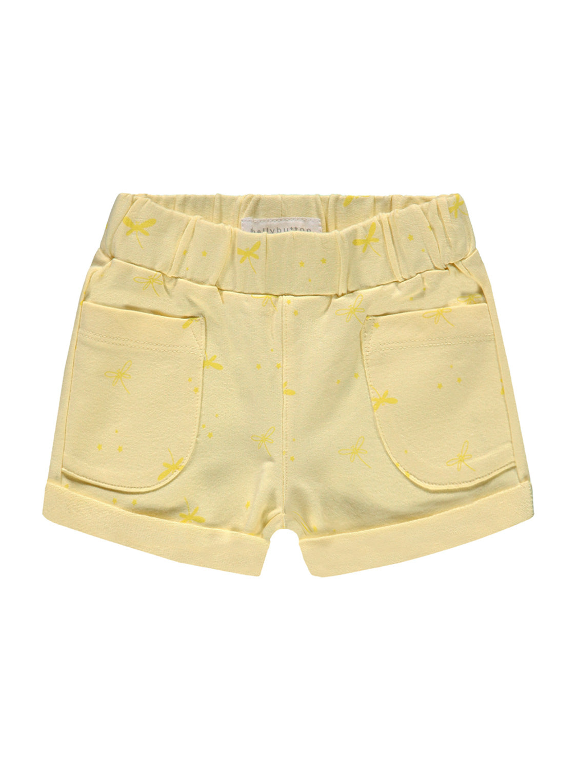Sweatshorts Gelb für Kinder mit elastischem Bund, umgeschlagenen Säumen, zwei Fronttaschen und einem Muster aus kleinen Libellen und Punkten. Perfekt für bequeme Kindermode bei bellybutton.