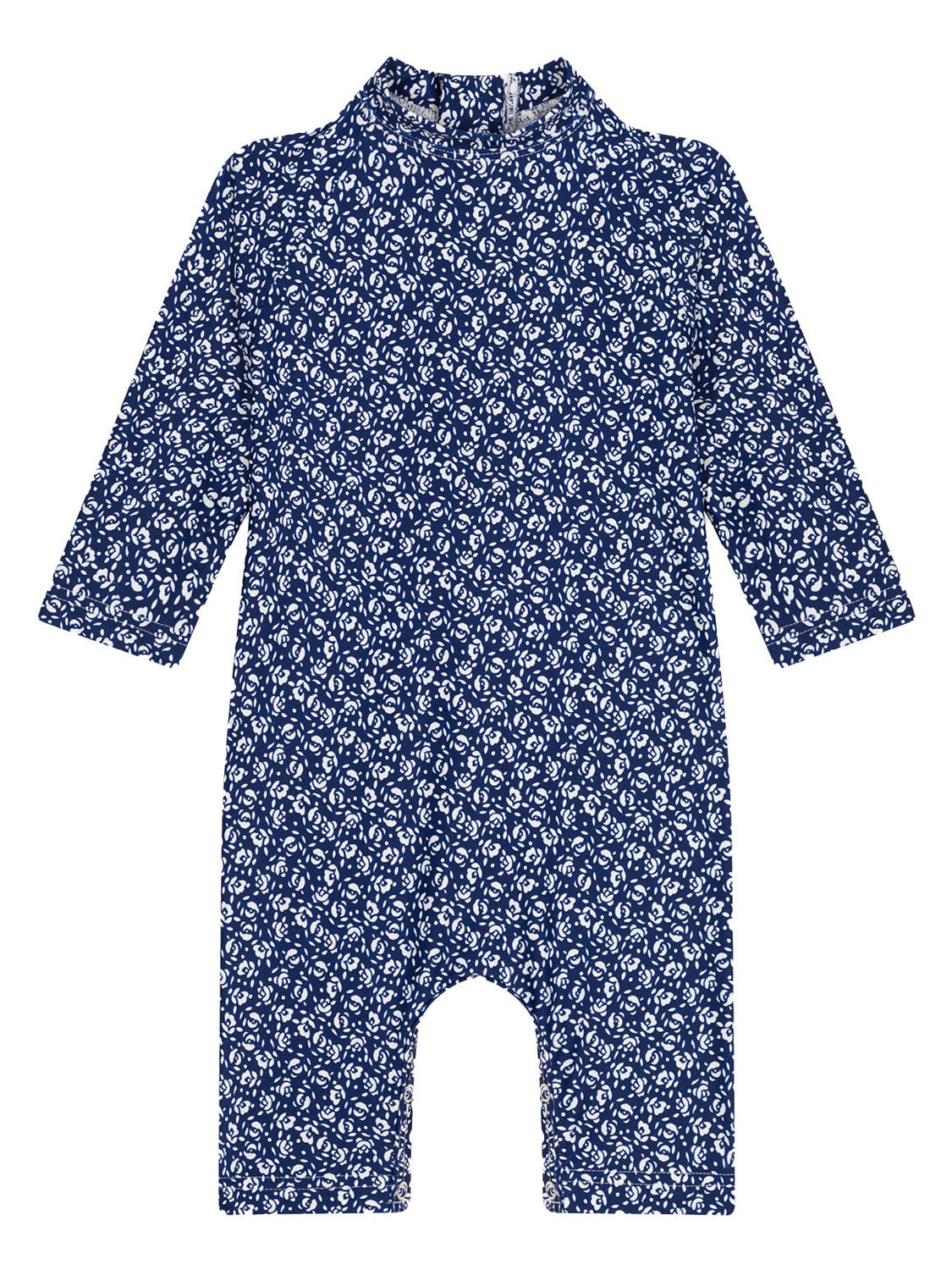 Langarm-Schwimmanzug MOULINETTE in blau: Navyblauer Babystrampler mit weißen Blumen, langen Ärmeln und Rundhalsausschnitt. Praktische Druckknöpfe am Schritt für einfache Windelwechsel.