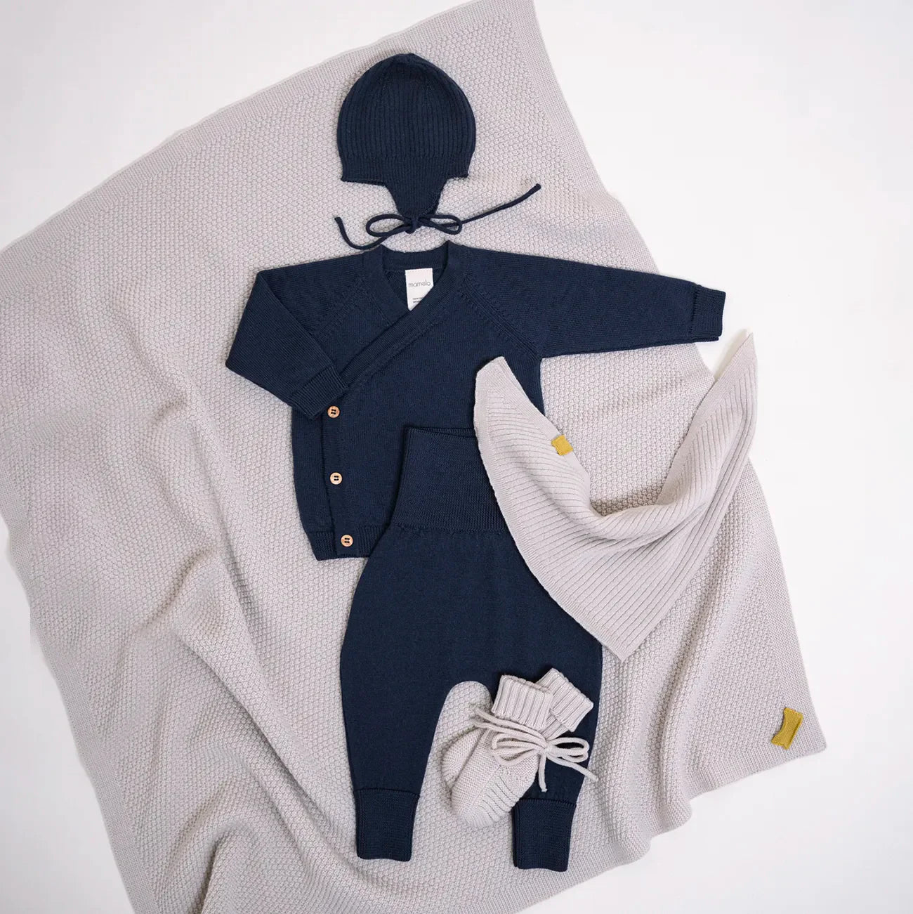 THE WOOLLY BABY JACKET - midnight blue